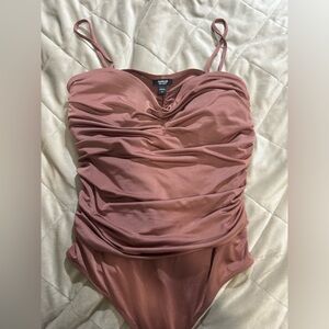 Women Express bodysuit. Medium.